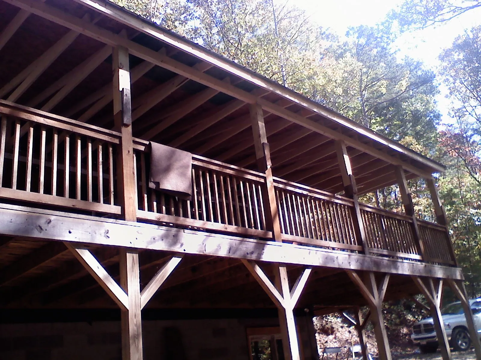 Timber framing under a new elevated porch and deck — Roof Leak Repair in Drayden by Roofing Brothers
